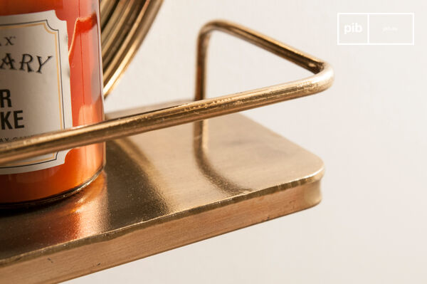 The Clémentine Shelf Mirror is a handy wall accessory with an elegant retro line to dress a wall