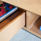 The storage space is dug on the sides to showcase your books.