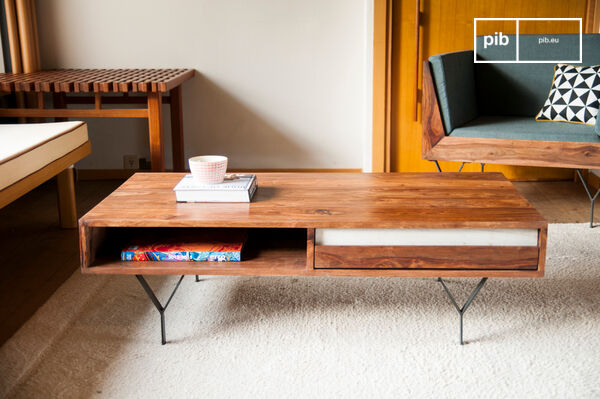 The coffee table has a unique design.