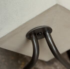 Robust dark steel foot.