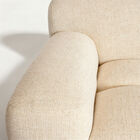 The backrest and armrests merge into a continuous curve