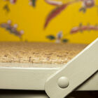 The cream structure leaves the rivets visible.