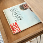 The desk has a beautiful light wood with a slight patina.