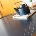 Sublime black marble top with fine white veins.