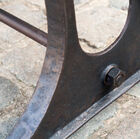 The cast iron base contributes to the balance of the table.