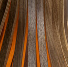 The composition consists of 32 wooden slats with a walnut finish.