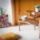 A very special side table made of solid wood.