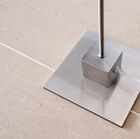 The reading light is very stable on its square base.