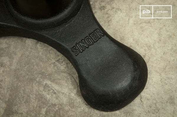 Dark cast iron stamped with the inscription