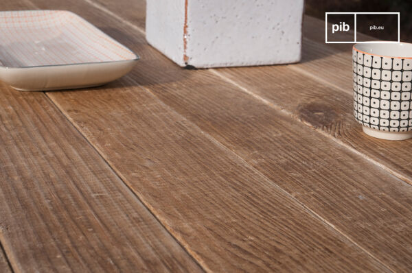 Opt for a wooden table top that has been given a lightly brushed surface filled with charm