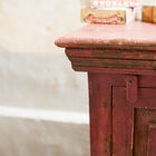 Romantic wardrobe in patinated mango wood.