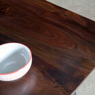 The rosewood is varnished and has a beautiful brown colour.