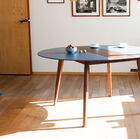 The pretty compass base is made of solid walnut.