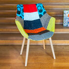 Superbe fauteuil vintage au revêtement original.