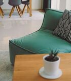 A graceful Italian-inspired fireside chair