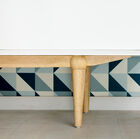 Pretty flared base in solid rubber wood.