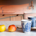 Pretty blue cups with patterns.