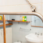 Chain mirror with chiselled finish.