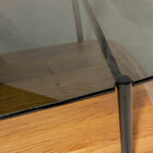 Its airy structure rests on two overlapping rounded tops