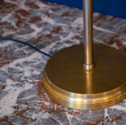 The Amber gold brass table lamp is inspired by traditional banker or library lamps to give an
