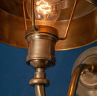 Thanks to its art deco look and gooseneck  well piece