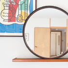 ce miroir attire l'oeil par son look oxydé vintage.