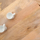 Les coins sont arrondis pour un table pleine de douceur.