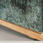 The frame reveals precise cabinetmaking: the corners are joined with visible straight-grain joints