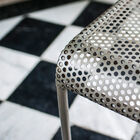 Elegant deep perforated seat, rounded at the front.