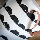 Beautiful light leather handles complete the design.