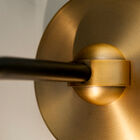 an aluminium structure with golden, brushed and matt finishes.