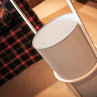 The lamp brings softness and elegance to a room.