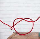 The red thread provides a nice contrast with the blue.