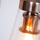 The hanging lamp is equipped with a lamp shade in the form of a cone