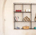Beautiful square wire mesh wall library.