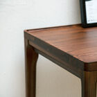 The corners of the console are rounded for softer lines.