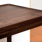 The walnut top is pleasant to the touch.