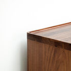 The top is enhanced by superbly finished edges.