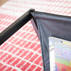 The magazine rack is made of leather in a beautiful dark colour.