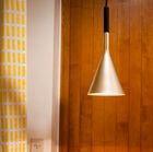 Illuminazione sospesa con finitura dorata Bob