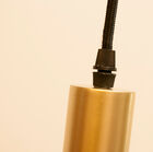 The luminaire is suspended by a high-quality textile cable.