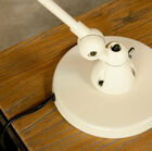 the lamp rests on a heavy base of 17cm in diameter which ensures good stability.