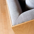 The cushions are embedded in a beautiful wooden chest.