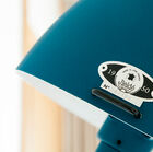 an ocean blue color, which has a touch of green that brings it closer to a petroleum blue.