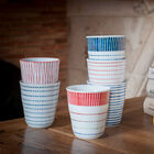 Set de 6 tazas de porcelana coloreada.