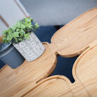 The table is made of varnished solid ash for a bright finish.