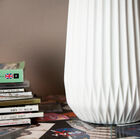 The Kamila vase enchants with both its characterful simplicity and its beautiful details that are