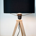 Pretty black lampshade that goes well with the wood of the base.