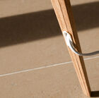 The cable is subtly integrated into the foot.