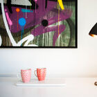 Thin and elegant aluminium lamp.